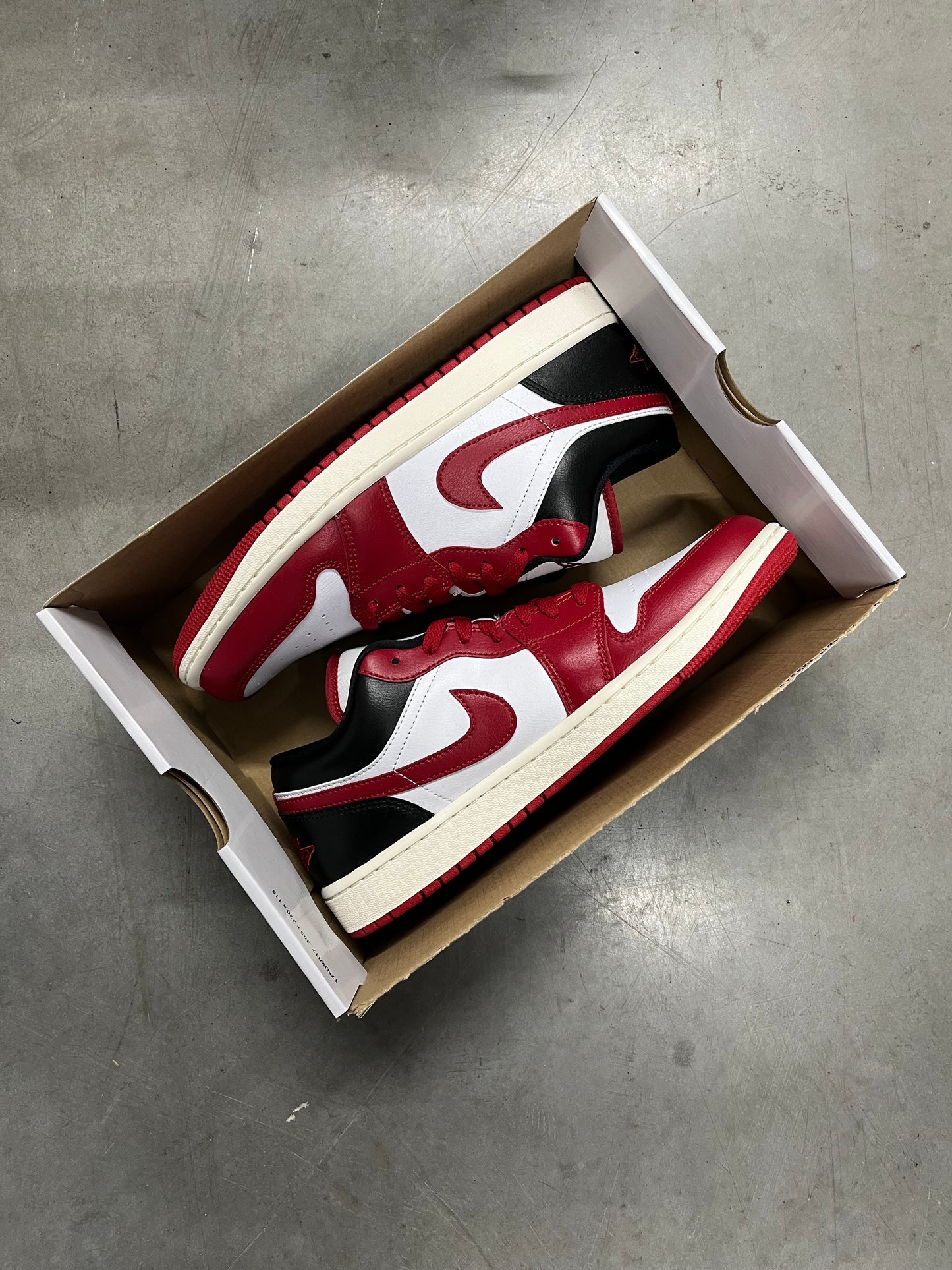 Jordan 1 Low Reverse Black Toe (Women's)